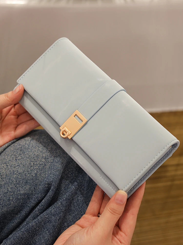 Autumn and winter new wallet women's long South Korea and South Korea small fresh PU leather solid color three fold bag simple s