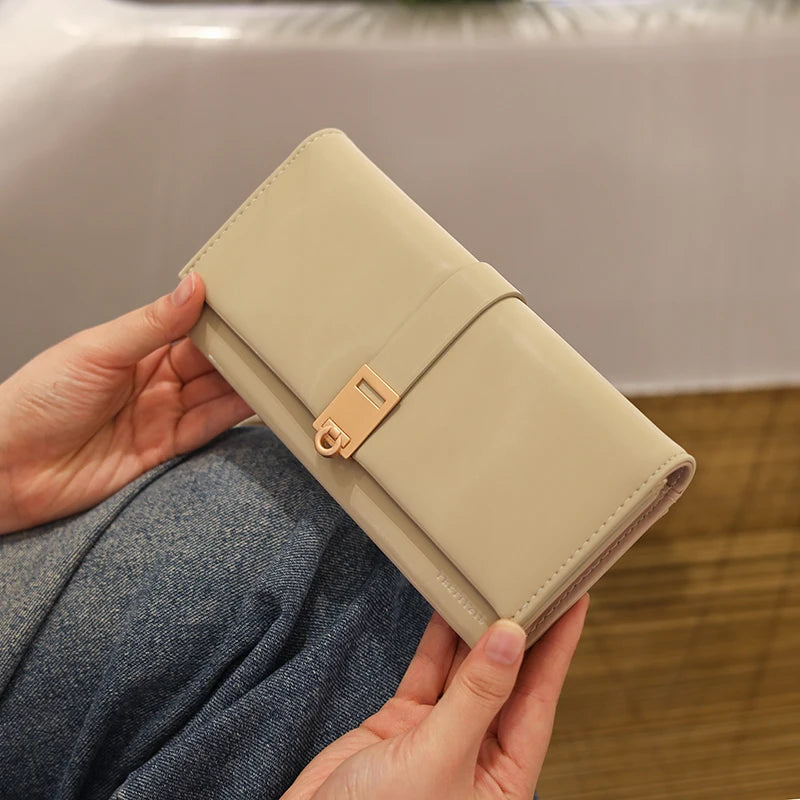 Autumn and winter new wallet women's long South Korea and South Korea small fresh PU leather solid color three fold bag simple s