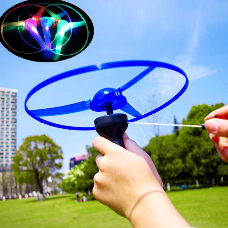 Kid Sports Pull Line Saucer Toys Children Outdoor Fun Rotating Flying Toy LED Light Processing Flash Flying Toy for Parks Beach