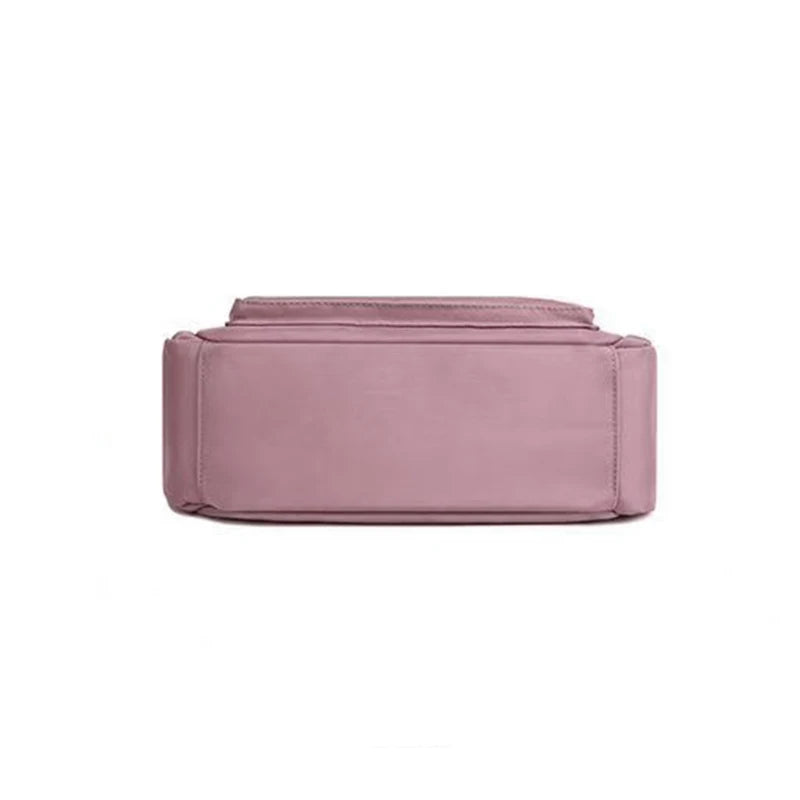 Women's handbag in various colors, multi-layered with zippers, can be worn diagonally or carried on the shoulder.
