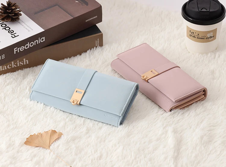 Autumn and winter new wallet women's long South Korea and South Korea small fresh PU leather solid color three fold bag simple s