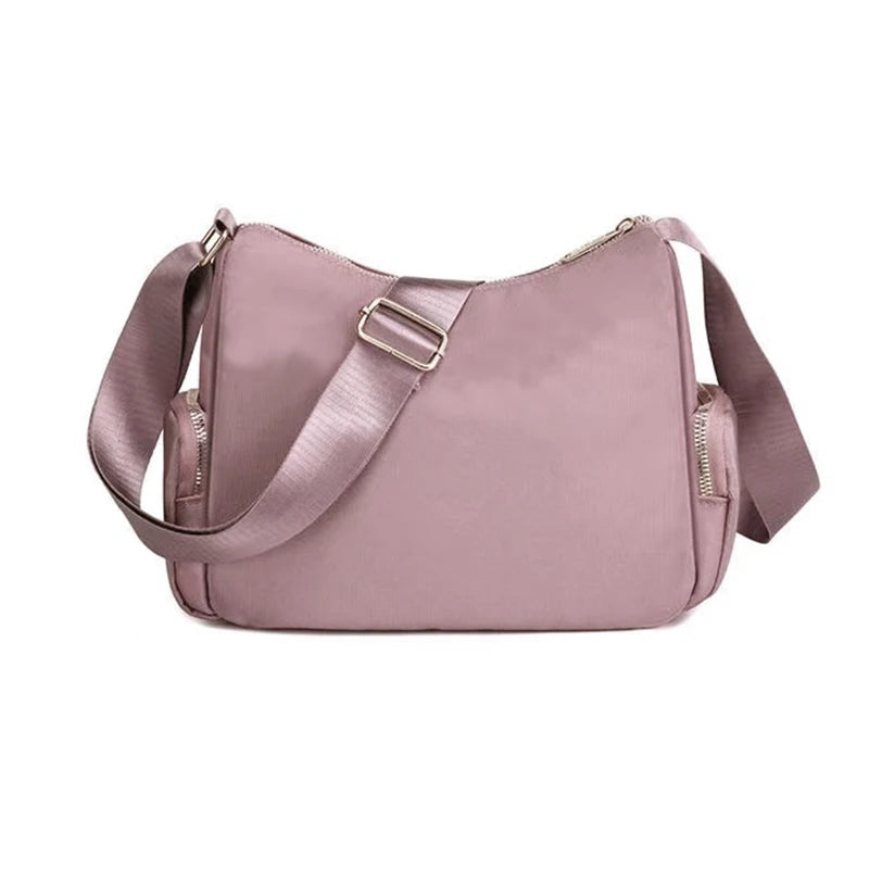 Women's handbag in various colors, multi-layered with zippers, can be worn diagonally or carried on the shoulder.