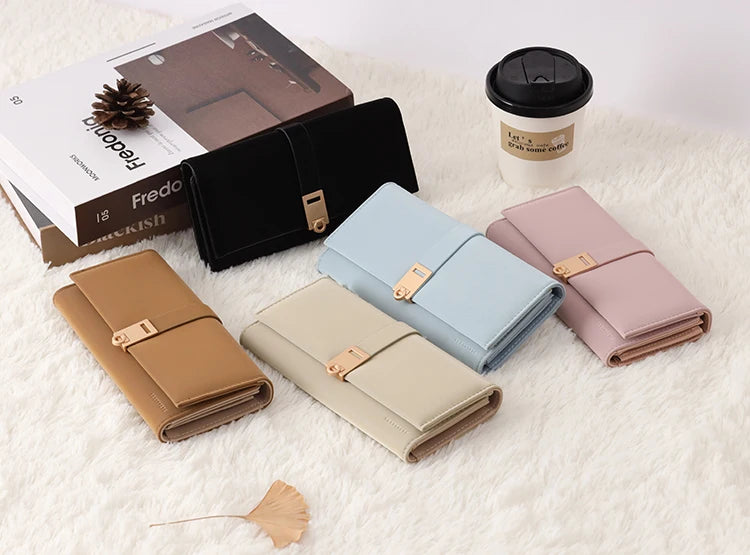 Autumn and winter new wallet women's long South Korea and South Korea small fresh PU leather solid color three fold bag simple s