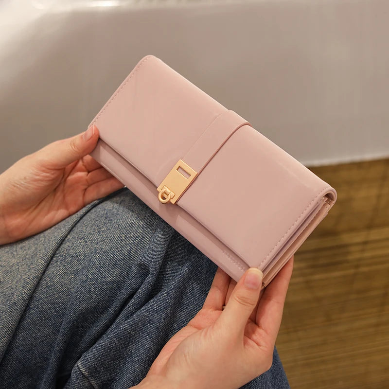 Autumn and winter new wallet women's long South Korea and South Korea small fresh PU leather solid color three fold bag simple s