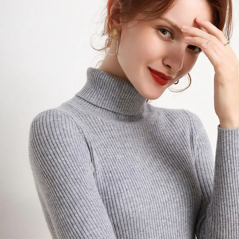 Autumn and winter new Korean slim fit women's pullover sweater knitted sweater pull up women's high neck sweater women
